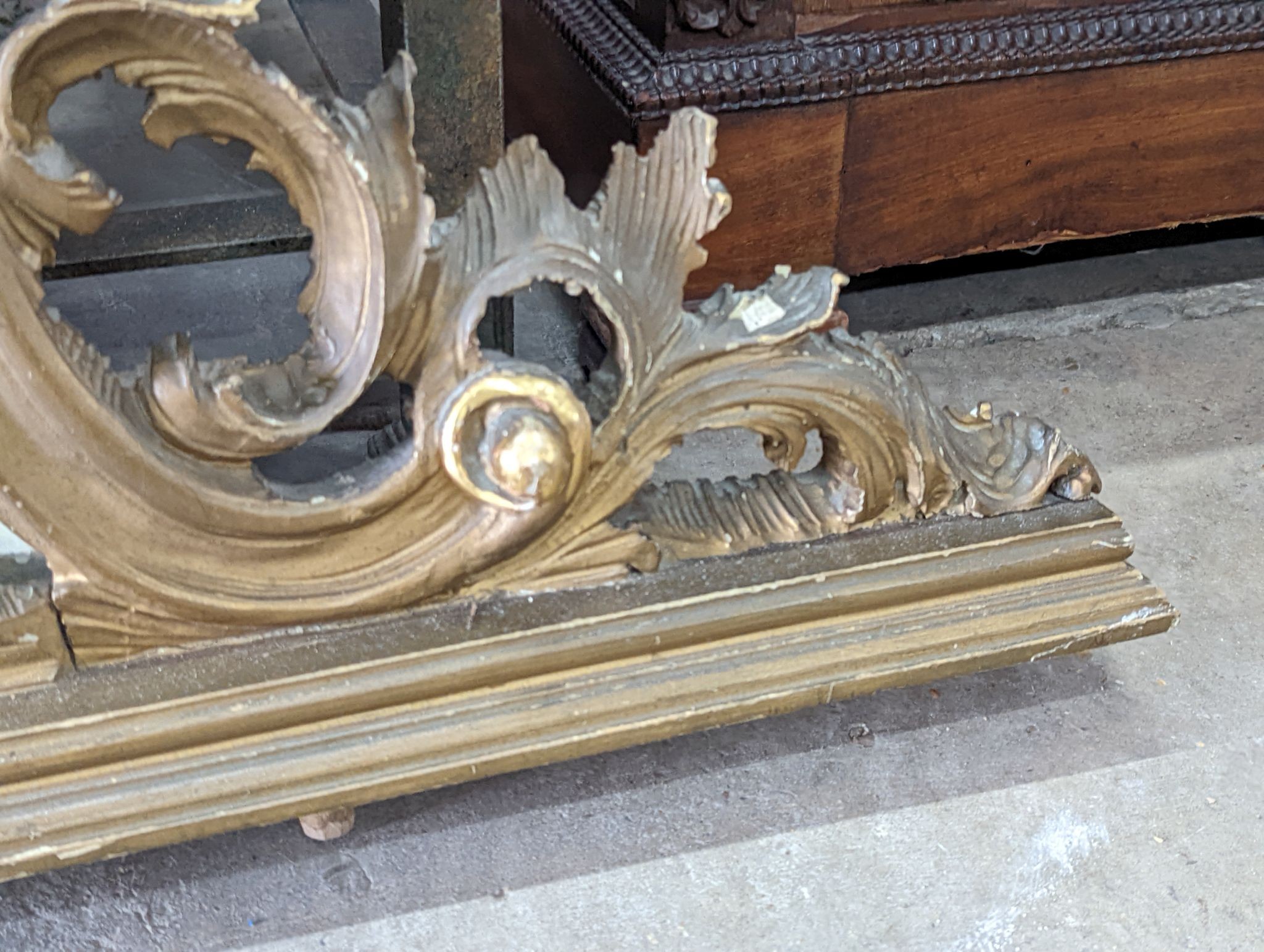 A Victorian style carved giltwood overmantel mirror, width 140cm, height 125cm